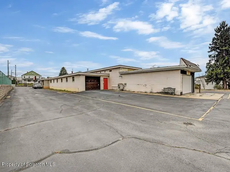 Mixed-use Building with Retail Space and Parking for Sale in Prime Location