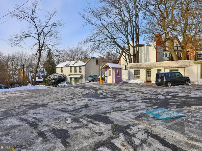 Historic Multi-use Building in Chestnut Hill Business District with Retail and Residential Units