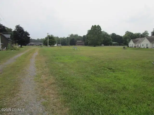 Partially Built Condo Development with Approved Plans in Picturesque Location