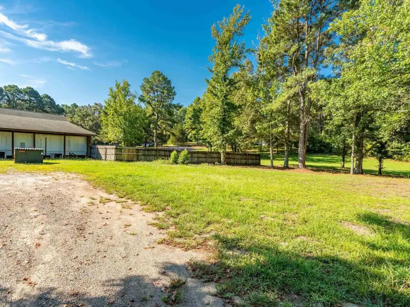 Established Log Cabin Liquor Store for Sale on Highway 70 with Drive-through Access