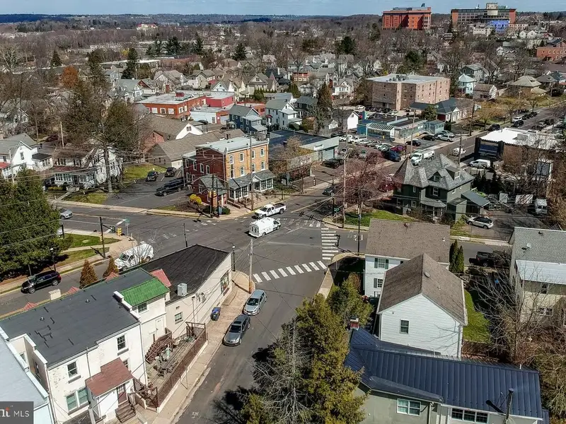 Multi-unit Building with Commercial Space and Two Residential Apartments in Established Location
