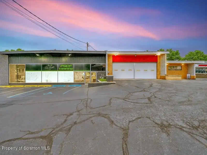 Mixed-use Building with Retail Space and Parking for Sale in Prime Location