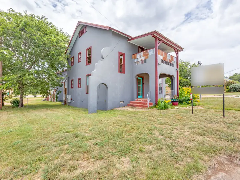 Historic Two-story Commercial Building with Garage Loft Apartment in Prime Location