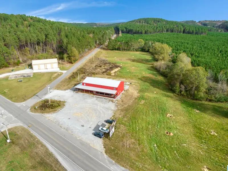 Prime Commercial Property Near Smith Lake with 3,800 Sq Ft Building and Billboard Income