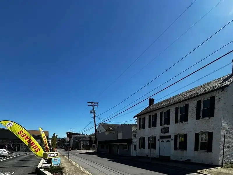 Large Commercial Building with Unique Floor Plan and Adjacent City-owned Lot for Sale
