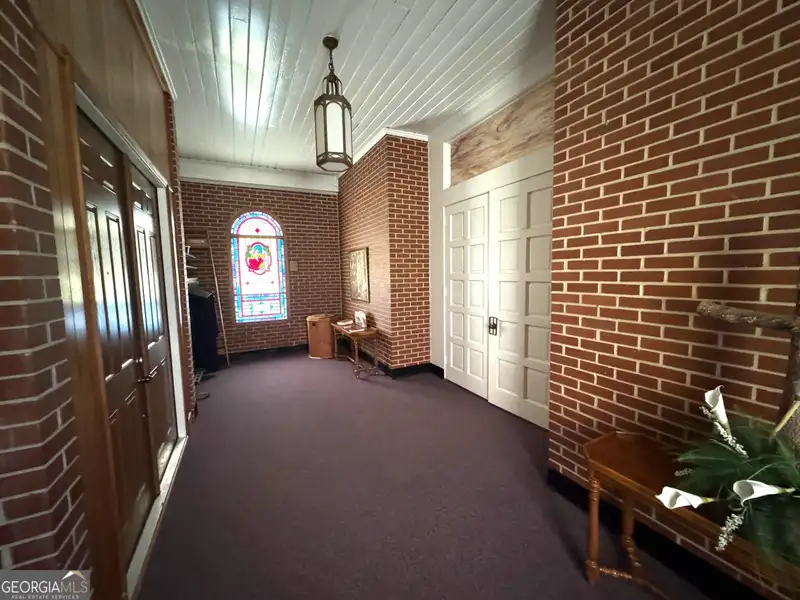 Multi-use Church Property with Sanctuary, Classrooms, Fellowship Hall, and Ample Parking