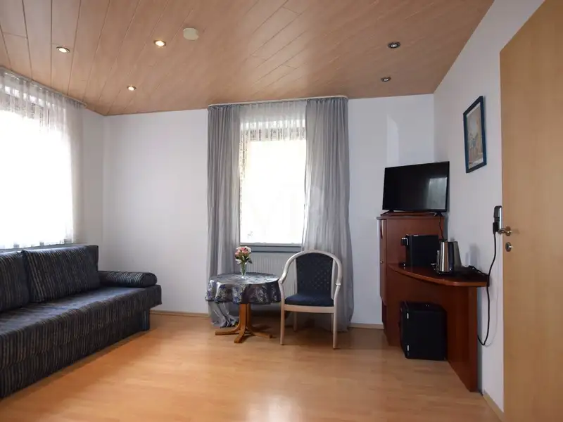 Historic Family-run Hotel in Ansbach with Restaurant, Guest Rooms, and Green Energy Features