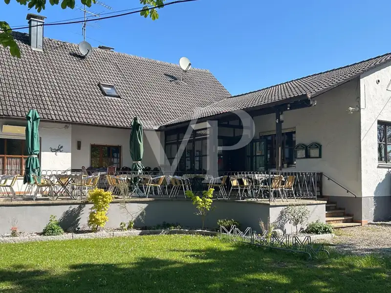 Versatile Residential and Commercial Building with Restaurant in Münchsmünster