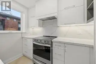 Renovated 2nd Floor Condo in Mid-town Toronto with Luxury Finishes and Modern Amenities