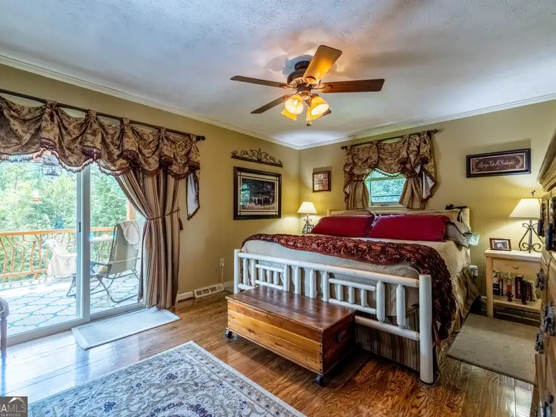 27 Acres with 2,400 Sq. Ft. Home, Duplexes, Pool, and Barn in Prime Location
