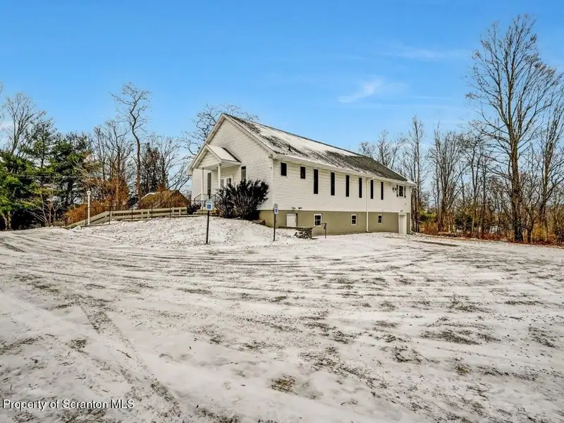 Versatile Former Church Building in Peaceful Location with Ample Parking and Creative Potential