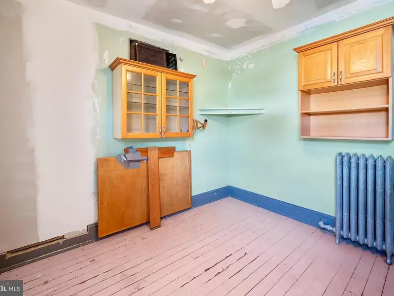 Multi-story Mixed-use Property with Apartment Potential in Prime Location