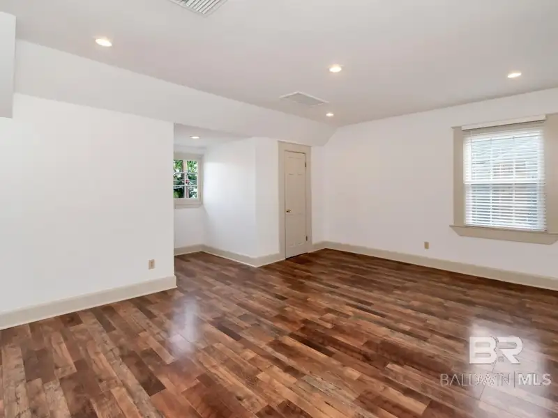 Mixed-use Property in Downtown Mobile, Alabama with High Ceilings and Hardwood Floors