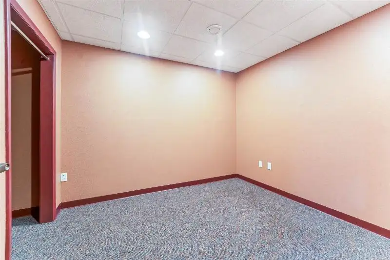 Versatile Commercial Condo for Sale Near Hwy 151 & 41 with Multiple Offices and Amenities