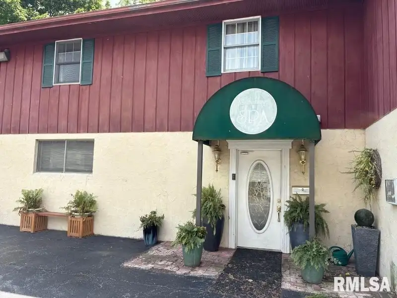 Versatile C-1 Zoned Property with 4 Bedrooms in Northwest Peoria Corner Lot
