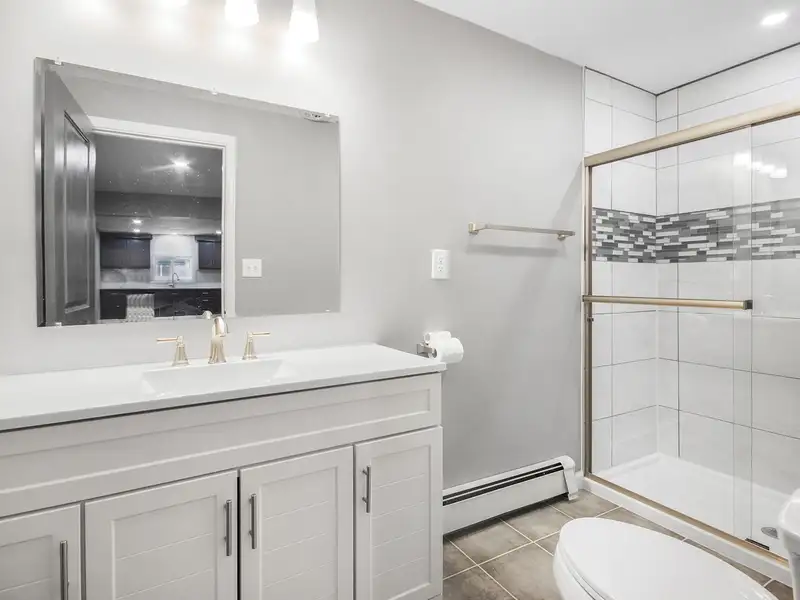 Mixed-use Two Unit Building with Remodeled Three Bedroom Apartment in Prime Location