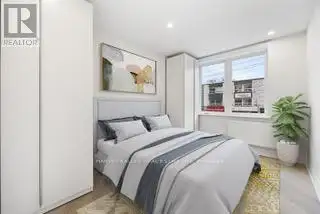 Renovated 2nd Floor Condo in Mid-town Toronto with Luxury Finishes and Modern Amenities