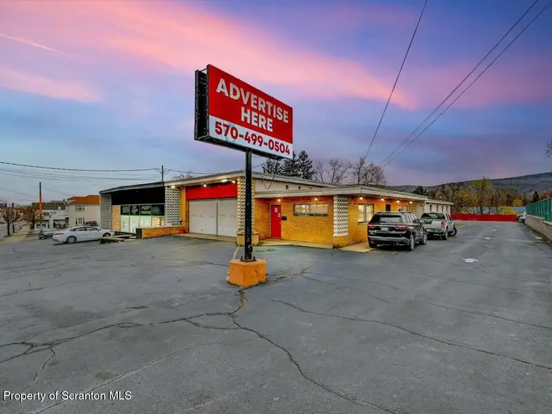 Mixed-use Building with Retail Space and Parking for Sale in Prime Location