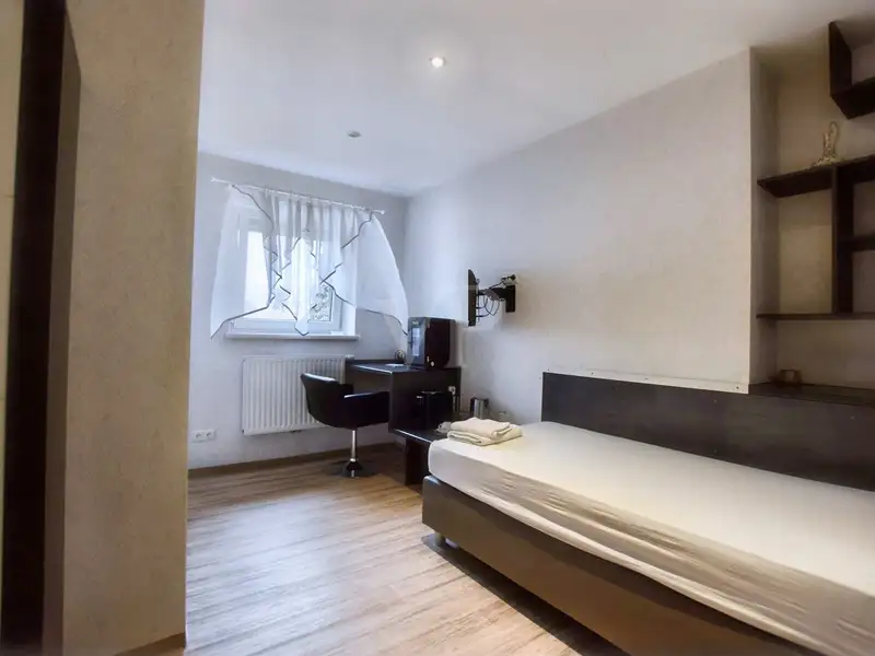 Historic Family-run Hotel in Ansbach with Restaurant, Guest Rooms, and Green Energy Features