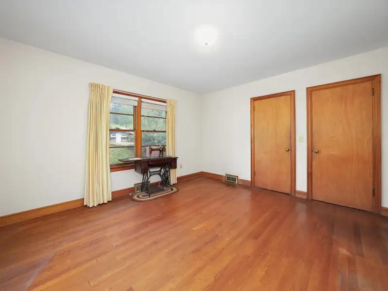 Prime 2.58-acre Multifunctional Property with Ranch Home and Outbuildings Near High-traffic Area