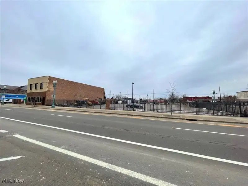 Well-maintained Two-story Brick Building with Retail and Workshop Space in Ne Location