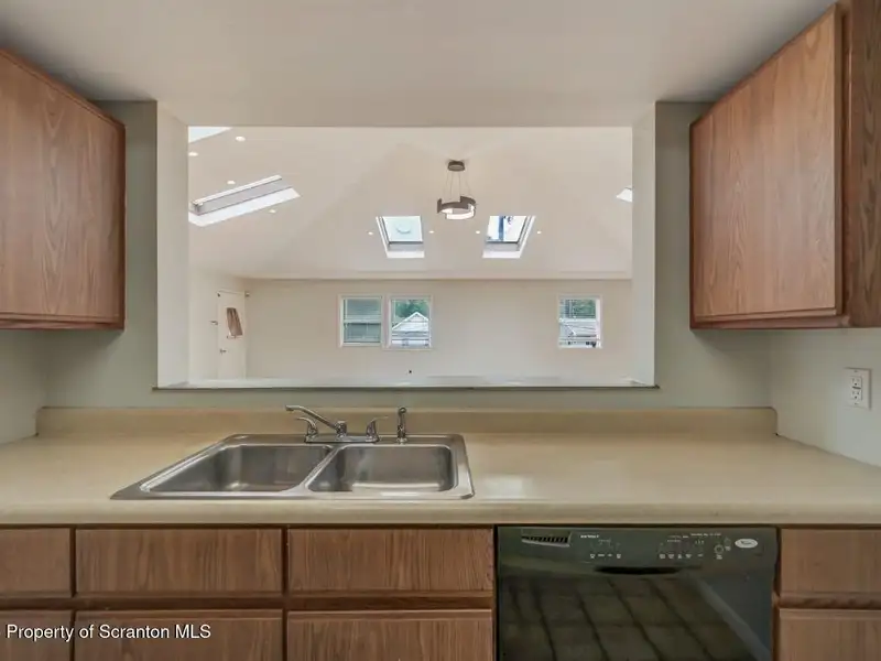 Mixed-use Property in Throop: 7-bay Garage and Updated 2-bedroom Apartment