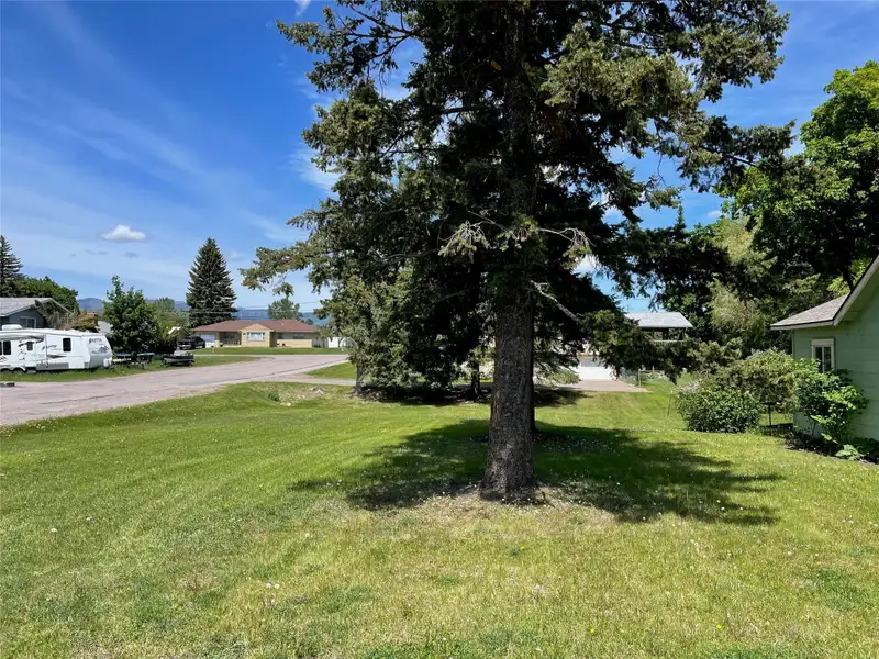 Commercial Corner Lot with 3 Bed Home in Columbia Falls, High Traffic Area