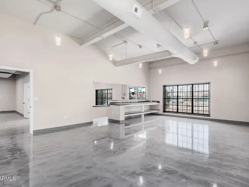 Versatile Commercial Property with Two Buildings and Ample Parking in Prime Location