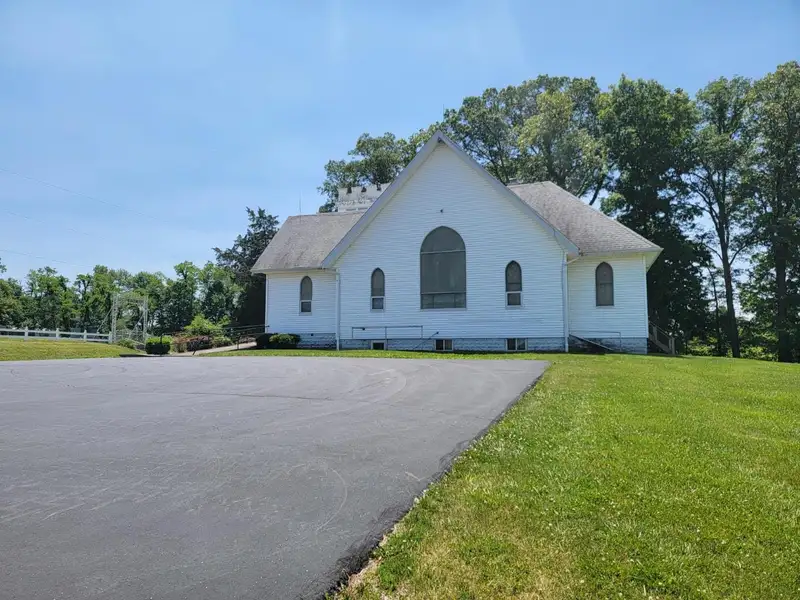 Charming Country Church with Stained Glass, Pristine Woodwork, and Redevelopment Potential