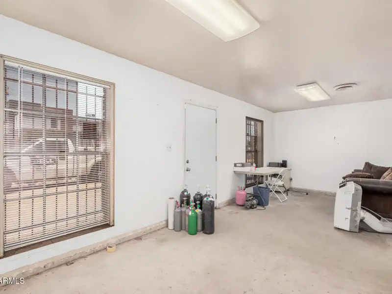 Versatile Commercial Property with Two Buildings and Ample Parking in Prime Location