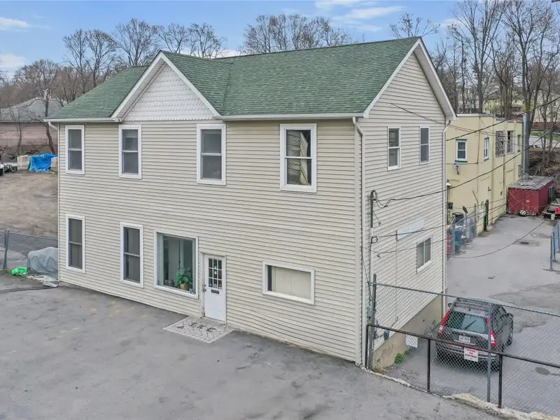 Mixed-use Property with Office, Garage, and Fully Rented Apartments in Middletown