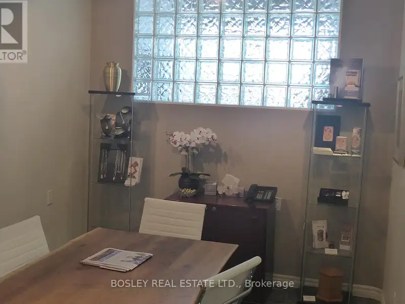 Leaside Retail Space with High Ceilings, Kitchen, and Ample Parking Near Lrt