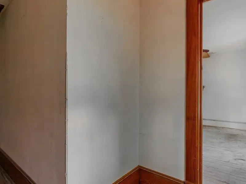 Classic American Foursquare Home in Need of Restoration with Detached Garage
