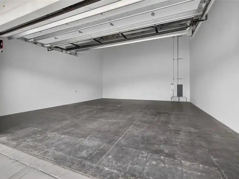 Exclusive Balcony Unit at the Motor Enclave with Private Garage and Racetrack Views