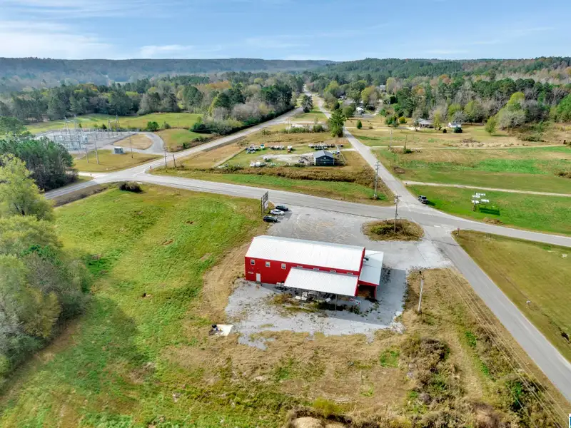 Prime Commercial Property Near Smith Lake with 3,800 Sq Ft Building and Billboard Income