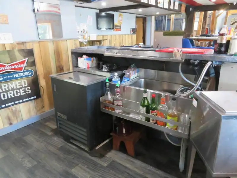 Turnkey Bar/restaurant with Apartment, Highway Access, and Development Potential in Northwoods