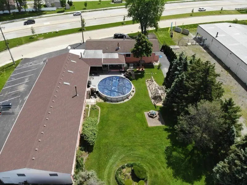 Turnkey Custom Plastics Manufacturing Business with Attached Home on 1.67 Acres
