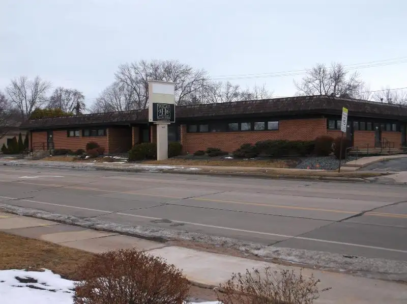 Remodeled 8420 Sf Office Building on Commercial Street, Neenah with Ample Parking and Facilities