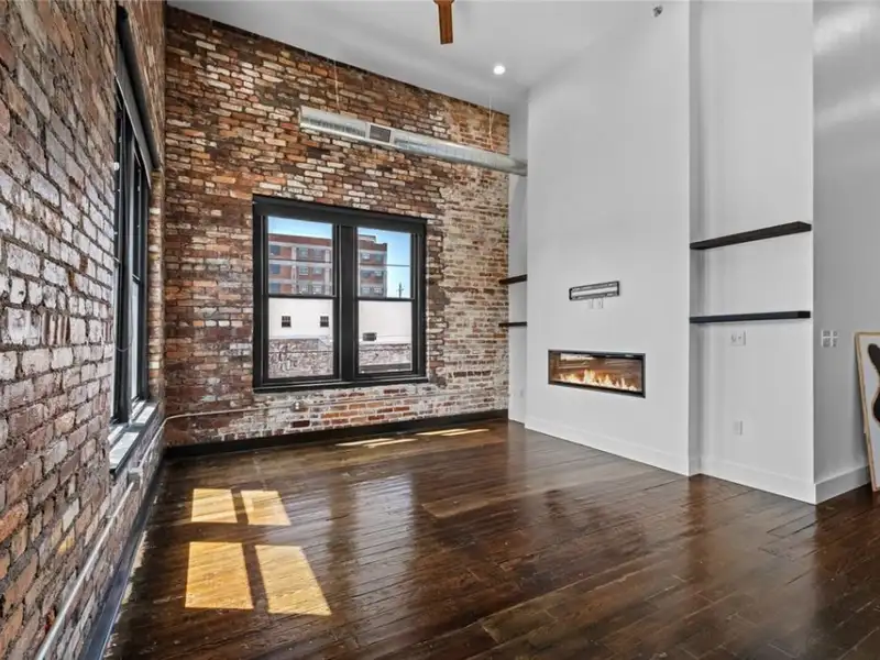 Mixed-use Commercial Property with Retail Space and Renovated Apartments in Downtown Joplin