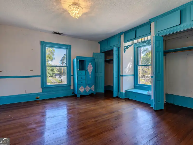 Versatile Commercial Building Near Downtown with Parking and Apartment Potential