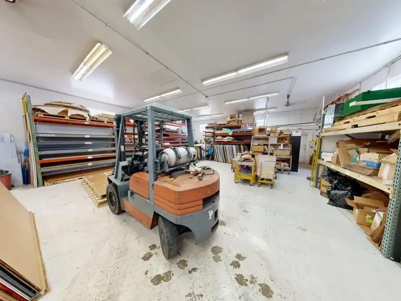 Turnkey Custom Plastics Manufacturing Business with Attached Home on 1.67 Acres