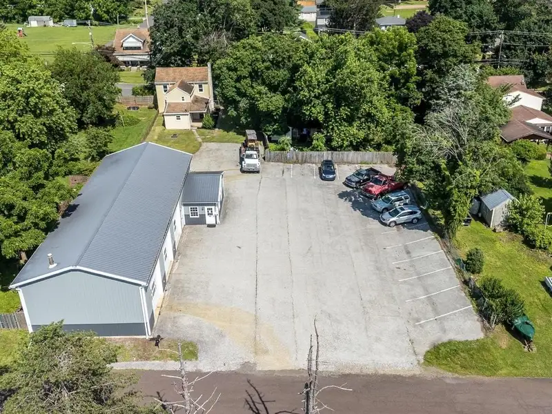 Auto Repair Shop with Residential Income Opportunity in Prime Location