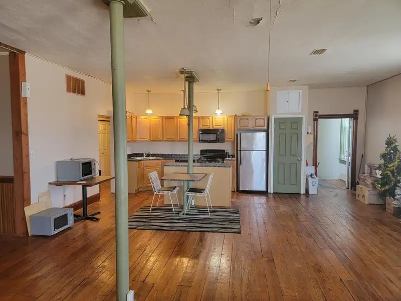 Investment Opportunity: Restaurant with Apartment and Additional Parking Near I-74