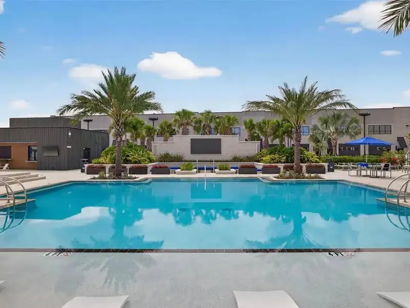 Exclusive Balcony Unit at the Motor Enclave with Private Garage and Racetrack Views