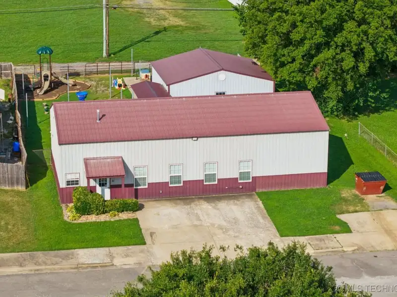 Turnkey Commercial Daycare Property in Downtown Fort Gibson with Dual Buildings and Equipment