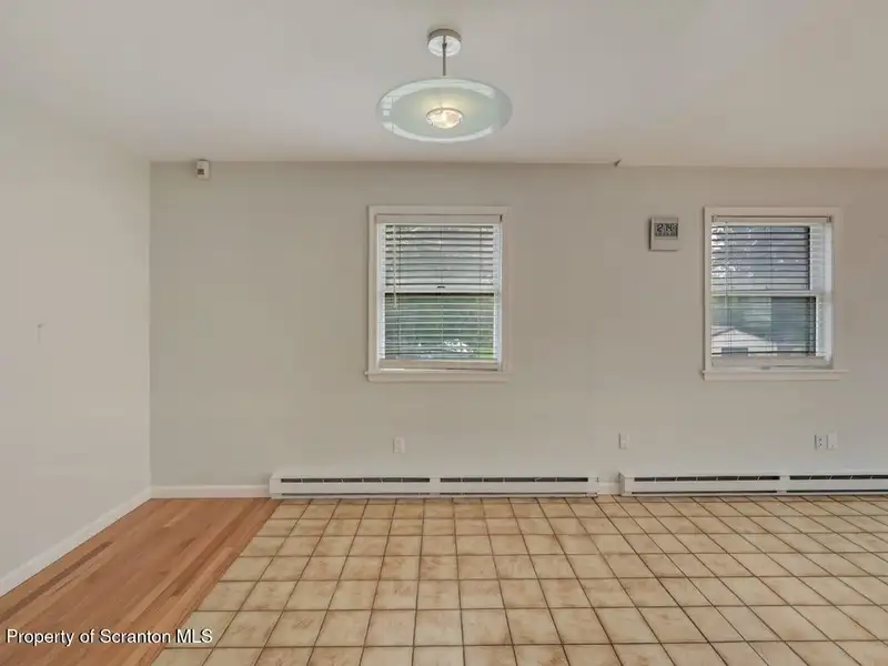 Mixed-use Property in Throop: 7-bay Garage and Updated 2-bedroom Apartment