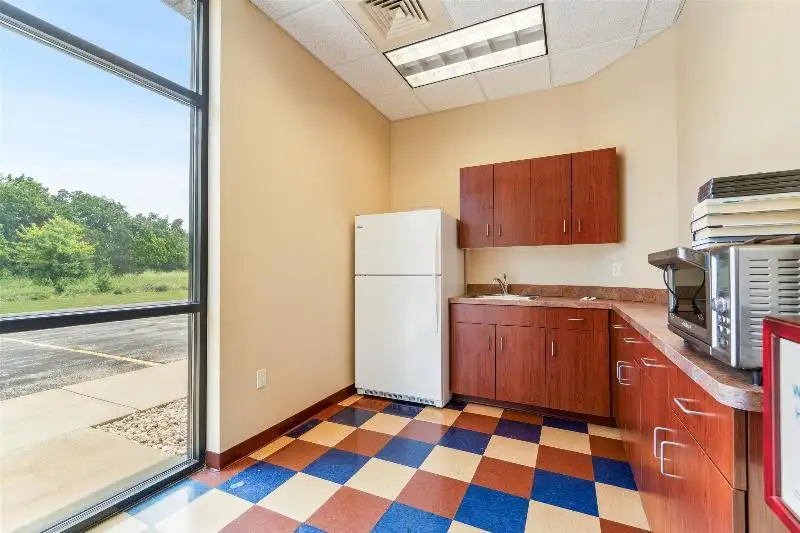Versatile Commercial Condo for Sale Near Hwy 151 & 41 with Multiple Offices and Amenities