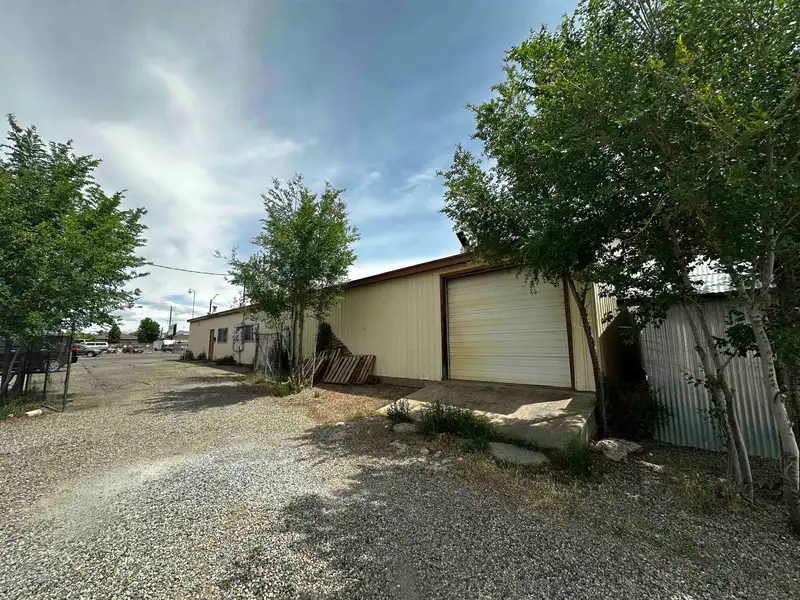 Warehouse with Gated Yard and Office Space in High Visibility Location