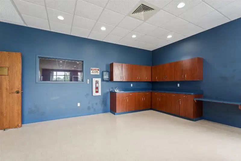 Versatile Commercial Condo for Sale Near Hwy 151 & 41 with Multiple Offices and Amenities