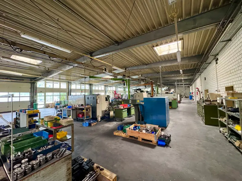 Versatile Commercial Property for Sale: 6,604 M² with Production Halls and Office Space